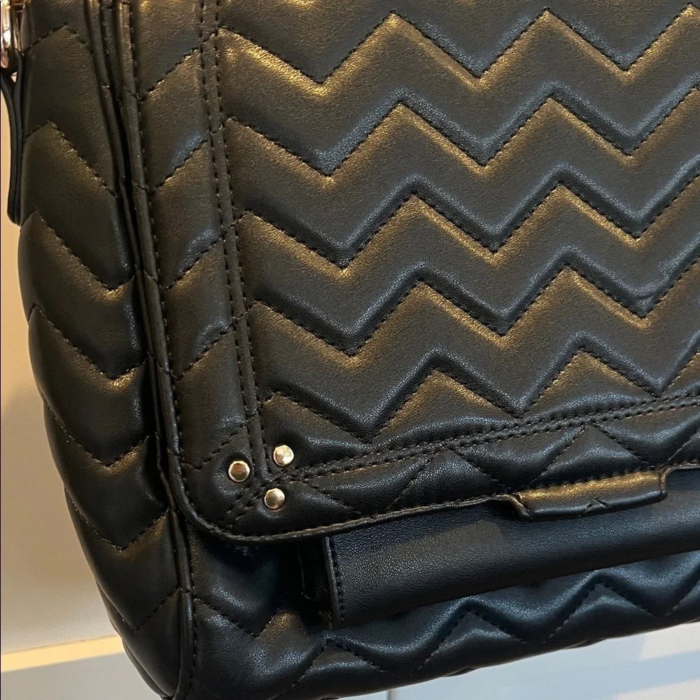 Black Quilted Chevron Crossbody Bag with Guitar style strap 9” X 11” X 4”